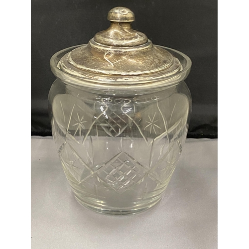 7 - A CUT GLASS JAR WITH A HALLMARKED BIRMINGHAM SILVER LID