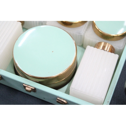 105 - A METAL CASED ART DECO VANITY SET