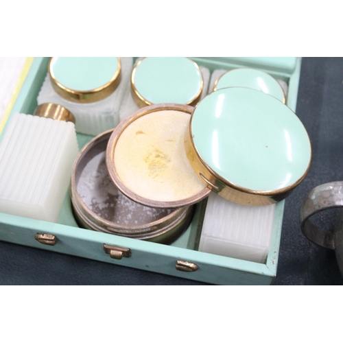 105 - A METAL CASED ART DECO VANITY SET