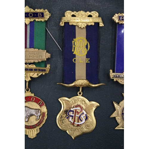 107 - FOUR VINTAGE MASONIC MEDALS