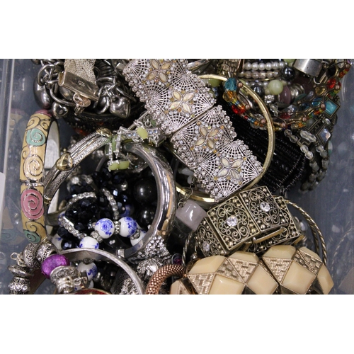 109 - A LARGE QUANTITY OF BRACELETS AND BANGLES