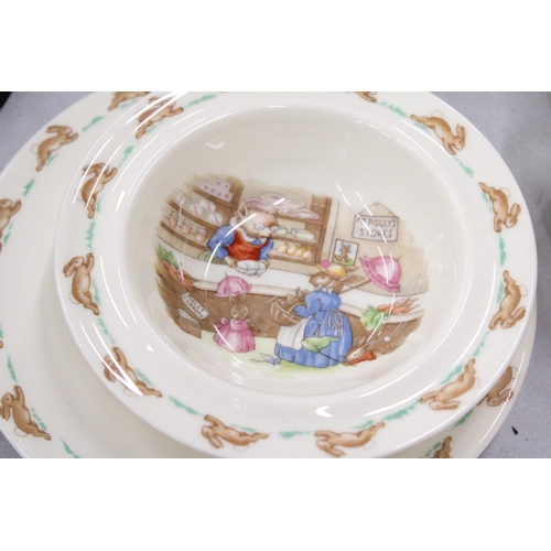 127 - A WEDGWOOD PETER RABBIT BOXED CHRISTENING SET INCLUDING A BOWL AND CUP PLUS ROYAL DOULTON BUNNYKINS ... 