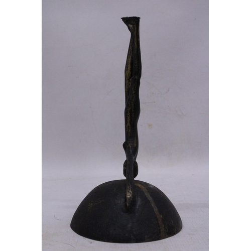 130 - A VINTAGE CAST IRON PAL-BELL DANCER SCULPTURE