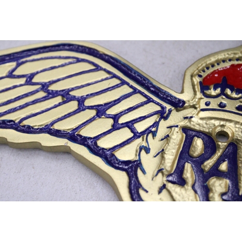 142 - AN RAF METAL PLAQUE, WIDTH 29CM