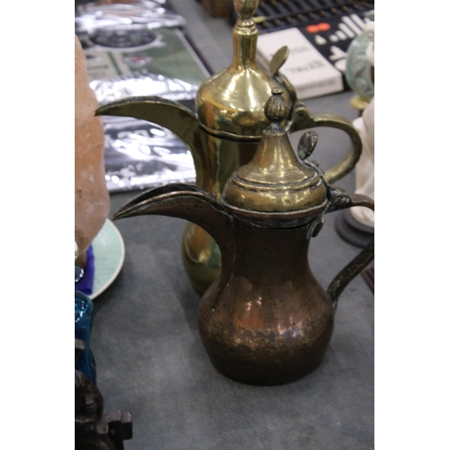 152 - TWO BRASS MIDDLE EASTERN COFFEE POTS