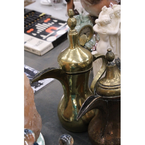 152 - TWO BRASS MIDDLE EASTERN COFFEE POTS