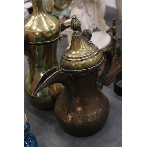 152 - TWO BRASS MIDDLE EASTERN COFFEE POTS