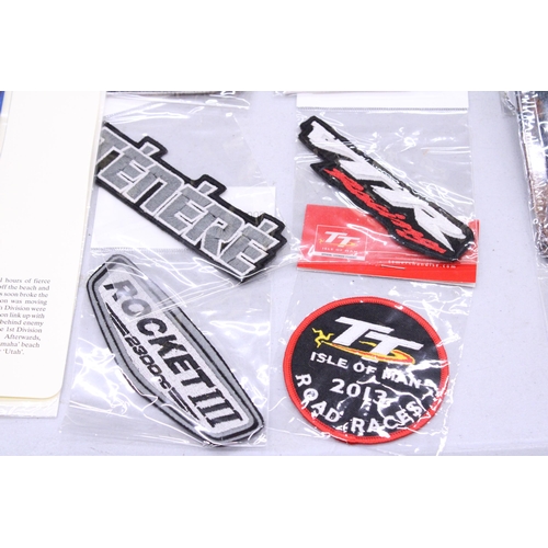 160 - TWENTY SEW ON MOTORING THEMED BADGES TO INCLUDE REPSOL, MOBILOIL, TT ISLE OF MAN, ETC - ALL AS NEW I... 