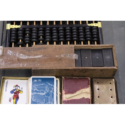 163 - A QUANTITY OF VINTAGE GAMES AND PLAYING CARDS TO INCLUDE A VINTAGE WOODEN ABACUS, MAGNET BUILDING SE... 