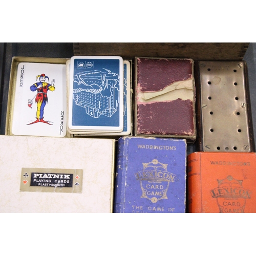 163 - A QUANTITY OF VINTAGE GAMES AND PLAYING CARDS TO INCLUDE A VINTAGE WOODEN ABACUS, MAGNET BUILDING SE... 