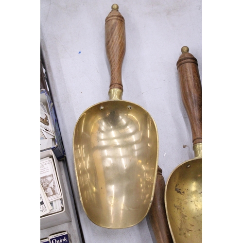 172 - THREE HEAVY BRASS GRAIN SCOOPS