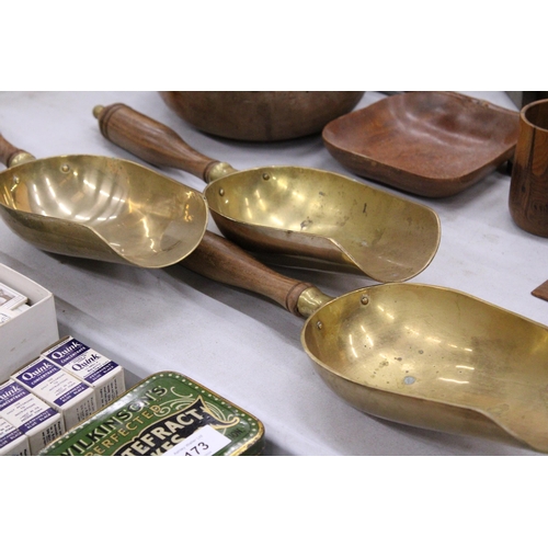 172 - THREE HEAVY BRASS GRAIN SCOOPS