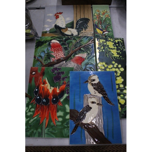 193 - SIX LARGE TUBELINED WALL HANGING TILES ON BOARDS WITH IMAGES OF FLORA AND BIRDS