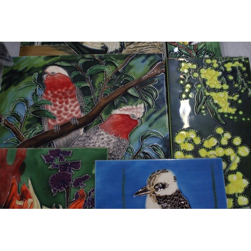 193 - SIX LARGE TUBELINED WALL HANGING TILES ON BOARDS WITH IMAGES OF FLORA AND BIRDS