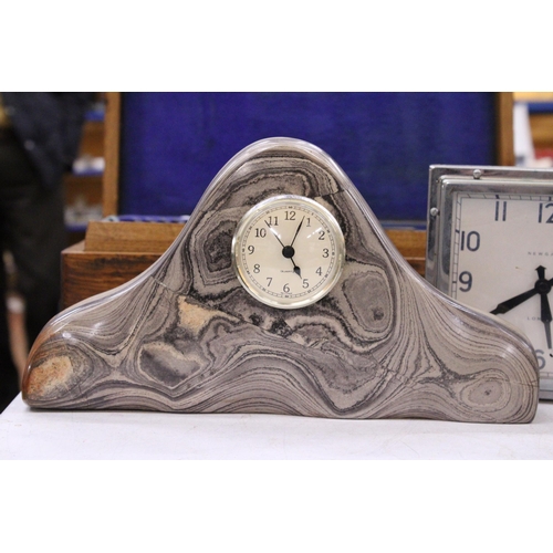 213 - TWO CLOCKS TO INCLUDE A HEAVY MARBLED STONE AND A NEWGATE ART DECO STYLE WITH BATTERY MOVEMENT