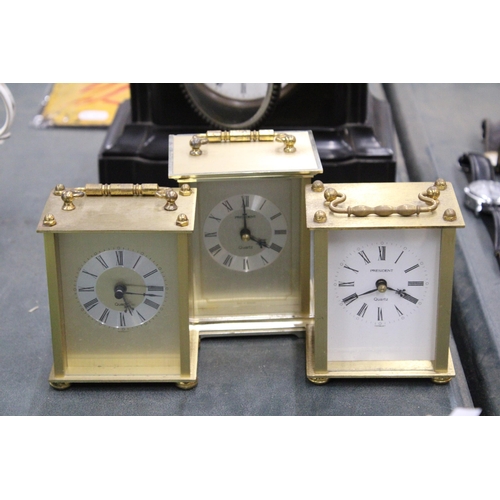 225 - THREE BRASS CARRIAGE CLOCKS