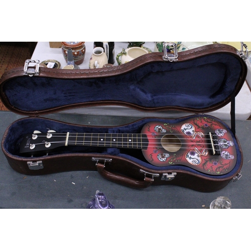 228 - A FAZLEY CASED UKELELE