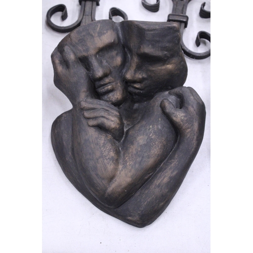 231 - A RESIN SCULPTURE OF A COUPLE, HEIGHT 30CM