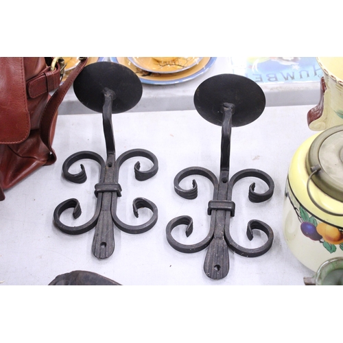 232 - TWO BLACK CAST IRON CANDLE SCONCES