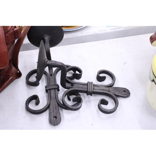 232 - TWO BLACK CAST IRON CANDLE SCONCES