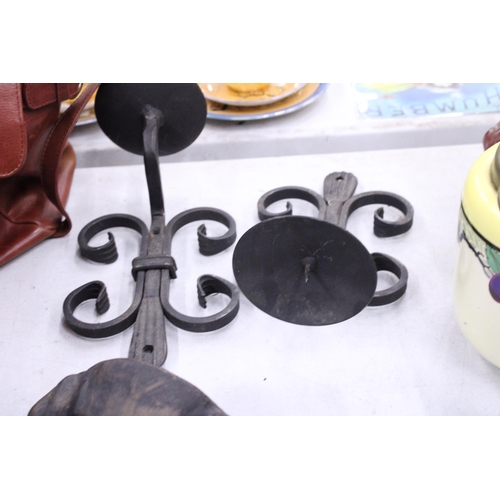 232 - TWO BLACK CAST IRON CANDLE SCONCES