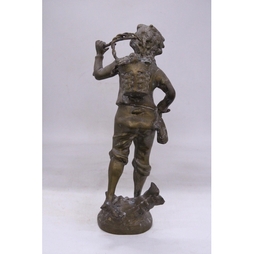 239 - A VINTAGE BRASS SCULPTURE OF A BOY WITH A BASKET, HEIGHT 35CM