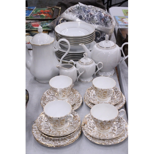 243 - A COLLECTION OF CHINA PLATES, SIDE PLATES, BOWLS, A TEA POT, COFFEE POT, CREAM JUG, SUGAR BOWL, CUPS... 