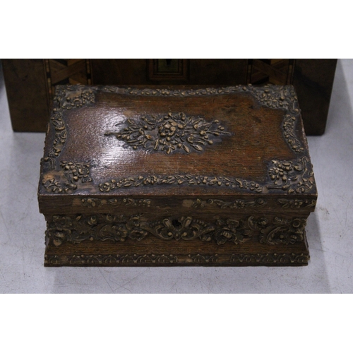 245 - TWO VINTAGE BOXES TO INCLUDE A MAHOGANY WORK BOX WITH MARQETRY INLAY AND A CARVED OAK CASKET