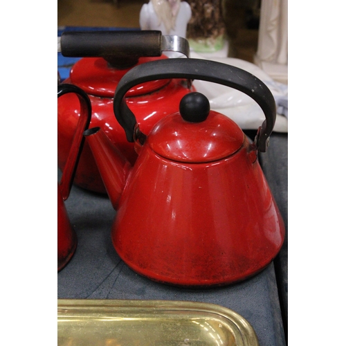 290 - THREE VINTAGE RED ENAMEL ITEMS TO INCLUDE A COFFEE POT AND TWO KETTLES