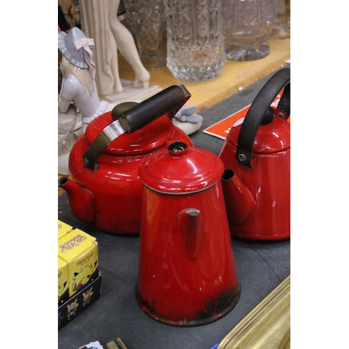 290 - THREE VINTAGE RED ENAMEL ITEMS TO INCLUDE A COFFEE POT AND TWO KETTLES