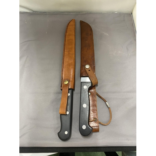 402 - A SABATIER KNIFE AND LEATHER SHEATH TOGETHER WITH A SWAN KNIFE AND SHEATH