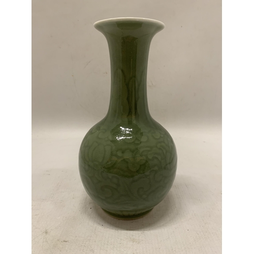 357 - A CHINESE CELADON GREEN GLAZED PORCELAIN BALUSTER VASE - 23 CM