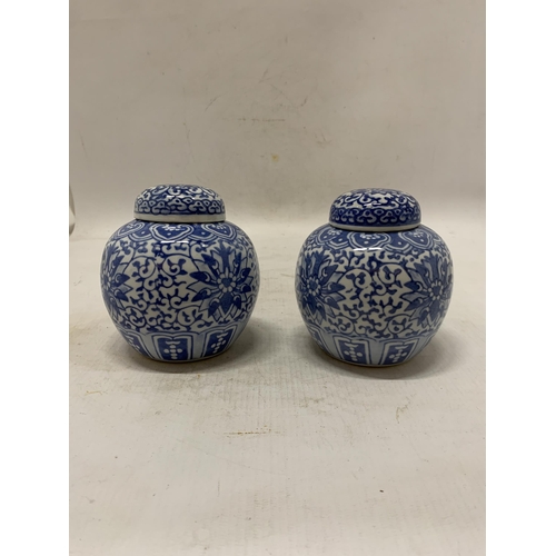 358 - A PAIR OF CHINESE BLUE AND WHTE FLORAL PORCELAIN LIDDED GINGER JARS