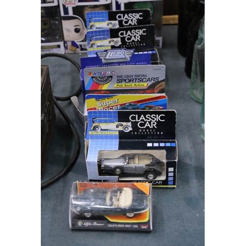 295 - SEVEN BOXED DIE-CAST CARS