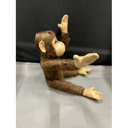 34A - A VINTAGE STEIFF JOCKO MONKEY WITH EAR BUTTON AND LABEL