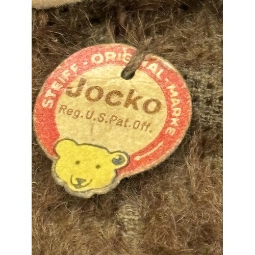 34A - A VINTAGE STEIFF JOCKO MONKEY WITH EAR BUTTON AND LABEL