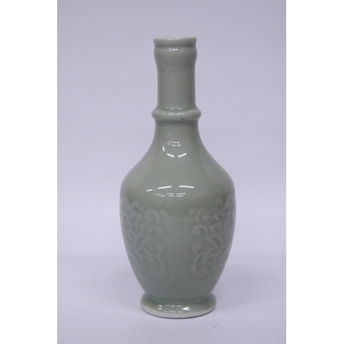 374 - A CHINESE GREEN GLAZE BALUSTER SHAPED VASE