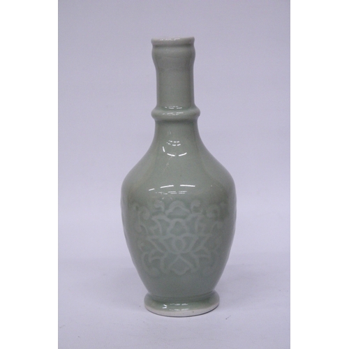 374 - A CHINESE GREEN GLAZE BALUSTER SHAPED VASE