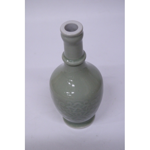 374 - A CHINESE GREEN GLAZE BALUSTER SHAPED VASE