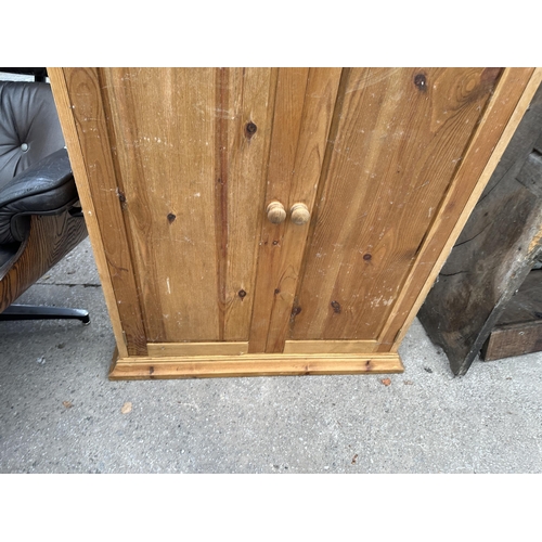 3106 - A PINE TWO DOOR CABINET