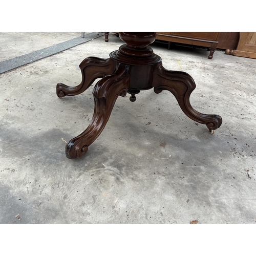 3110 - AN OVAL VICTORIAN TILT TOP LOO TABLE 57