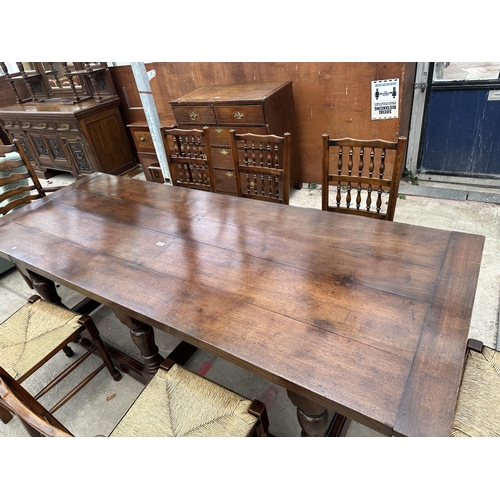 3111 - AN OAK JACOBEAN STYLE SIX LEG REFECTORY DINING TABLE 96