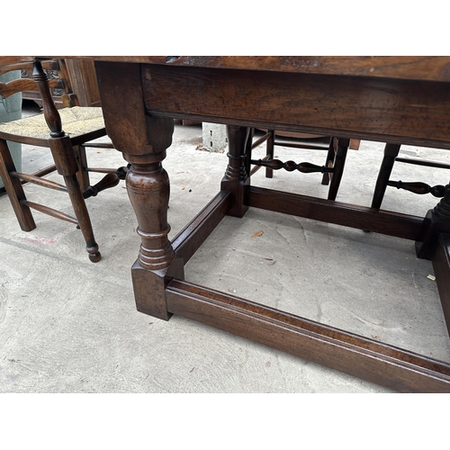 3111 - AN OAK JACOBEAN STYLE SIX LEG REFECTORY DINING TABLE 96