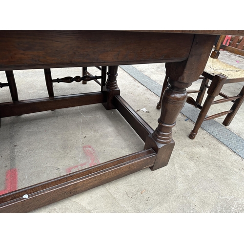 3111 - AN OAK JACOBEAN STYLE SIX LEG REFECTORY DINING TABLE 96