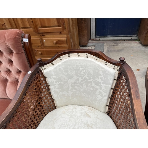 3115 - A PAIR OF BERGERE TUB CHAIRS ON TAPERING FRONT LEGS