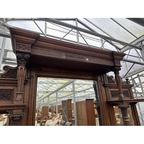 3117 - A VICTORIAN OAK MIRROR BACK SIDEBOARD WITH THREE FRIEZE DRAWERS AND FOUR CARVED PANEL DOORS TO BASE ... 