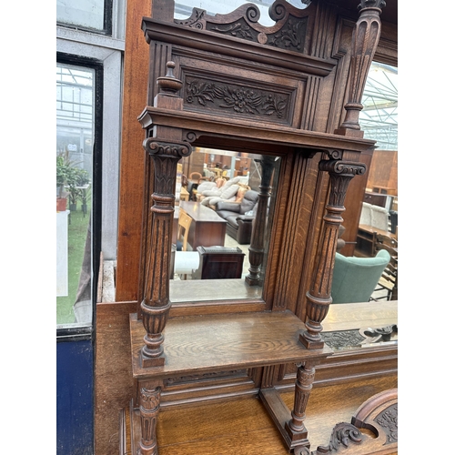 3117 - A VICTORIAN OAK MIRROR BACK SIDEBOARD WITH THREE FRIEZE DRAWERS AND FOUR CARVED PANEL DOORS TO BASE ... 