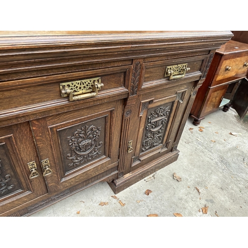 3117 - A VICTORIAN OAK MIRROR BACK SIDEBOARD WITH THREE FRIEZE DRAWERS AND FOUR CARVED PANEL DOORS TO BASE ... 