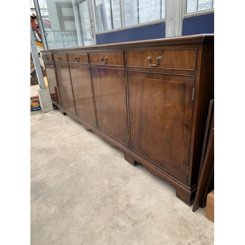 3121 - A RACKSTRAW MAHOGANY INLAID SIDEBOARD ENCLOSING FOUR DRAWERS AND FOUR CUPBOARDS 101