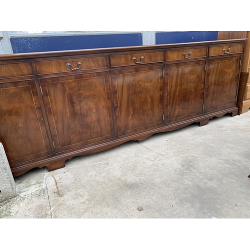 3121 - A RACKSTRAW MAHOGANY INLAID SIDEBOARD ENCLOSING FOUR DRAWERS AND FOUR CUPBOARDS 101